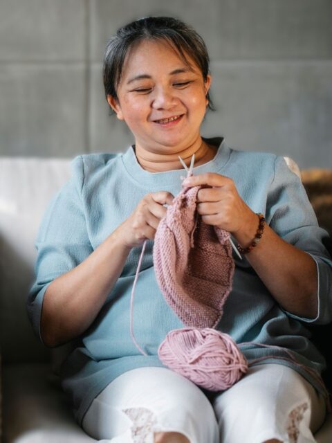 Person knitting at Knit and Katter event Trafford